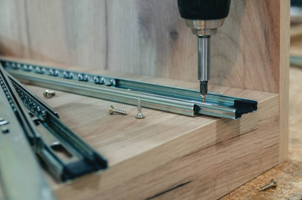 istock Assembling of furniture closeup 1006779034