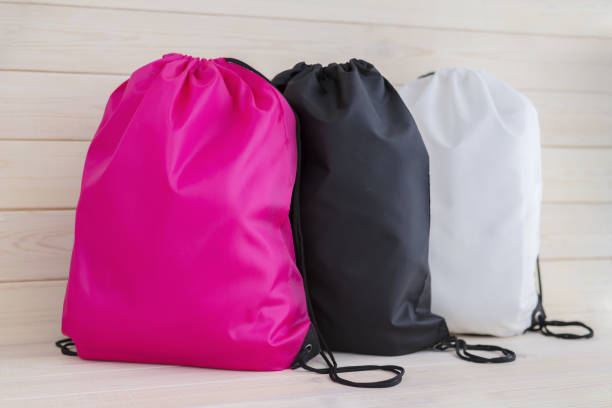 Three drawstring pack template, bag for sport shoes isolated on white