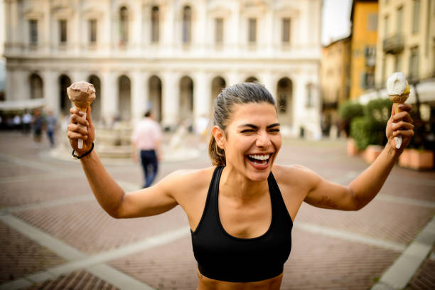 Sporty woman with ice creams.