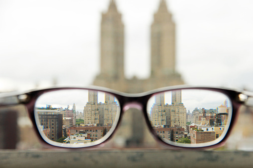 Blurry to clear view of NYC through glasses