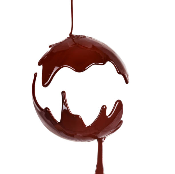 Chocolate Melted chocolate syrup on white background. Liquid chocolate on a white background. water balls for plants pictures stock pictures, royalty-free photos & images