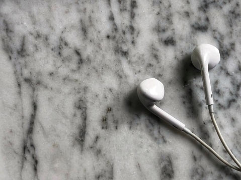 Earbuds on marble