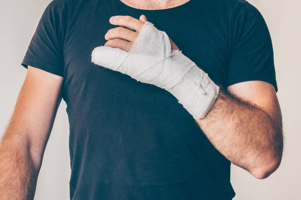 istock Man with an industrial hand injury 1006798648
