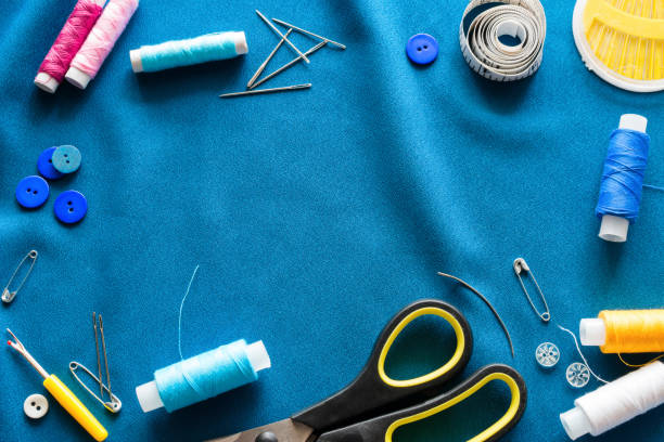 istock accessories for sewing on a blue background mockup 1006798662