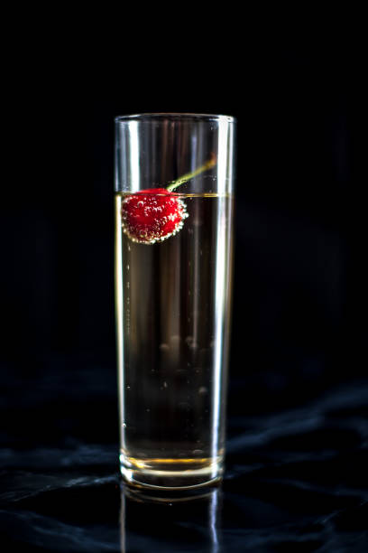 Drink with cherry in it stock photo
