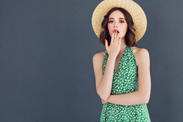 istock Young beautiful woman wearing hat 1006812032