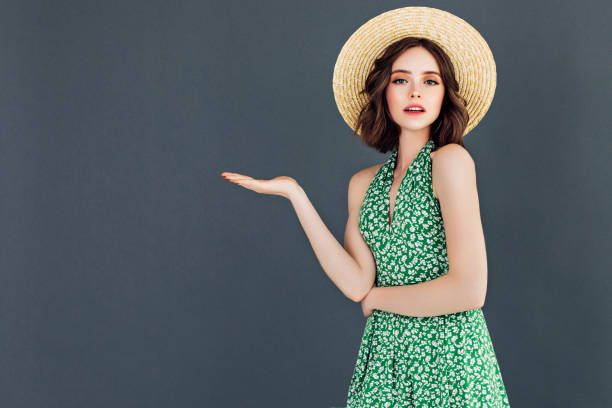 istock Young beautiful woman wearing hat 1006812126