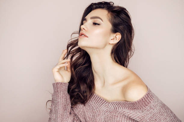 istock Beautiful woman wearing sweater 1006812432