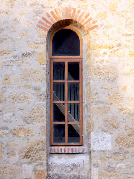 istock Old, wooden staircase, seen through the church window 1006816708