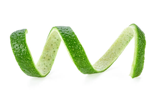 istock Fresh lime peel isolated on a white background. Healthy food. 1006821186