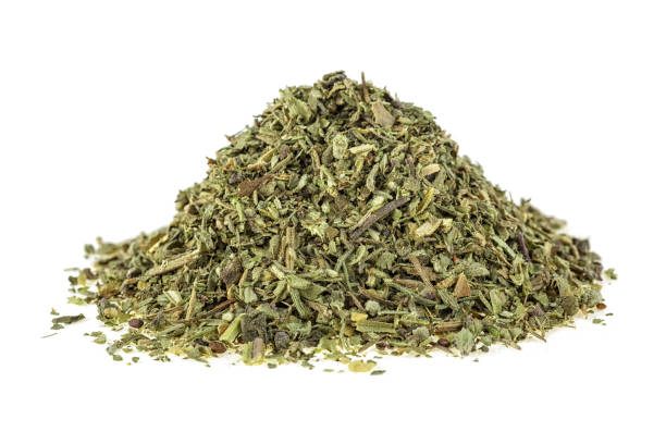 istock Mixed Italian herb seasoning on a white background 1006821210