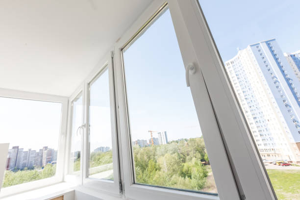 istock White metal-plastic windows of balcony in modern apartment 1006833184