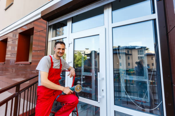 istock builders worker installing glass windows on facade of business building using glass suction plates 1006839462
