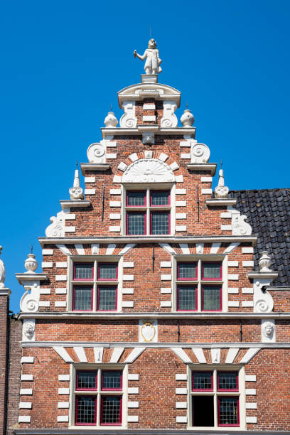 istock typical Dutch houses with stepped gable in Hoorn, The Netherlands 1006849498