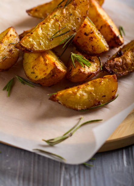 istock grilled potatoes rosemary wooden background 1006865234