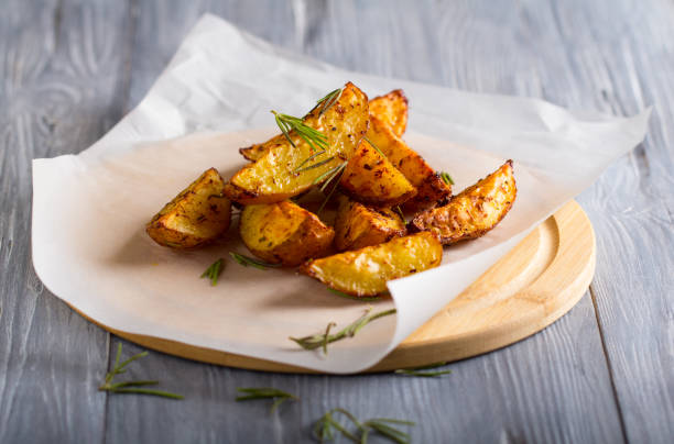 istock grilled potatoes rosemary wooden background 1006869322