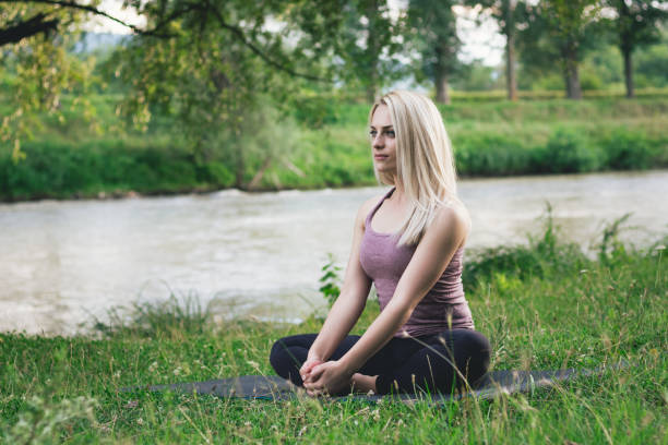 istock Quiet your mind, do yoga in nature 1006870456