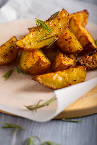 istock grilled potatoes rosemary wooden background 1006874272