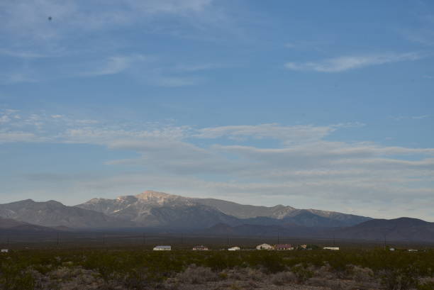istock blue sky and clouds over the Mojave Desert landscape 1006874956