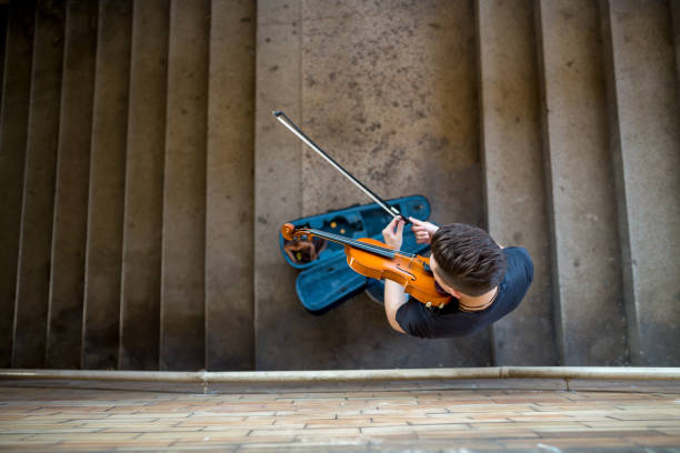 istock Street musician playing violin 1006874986