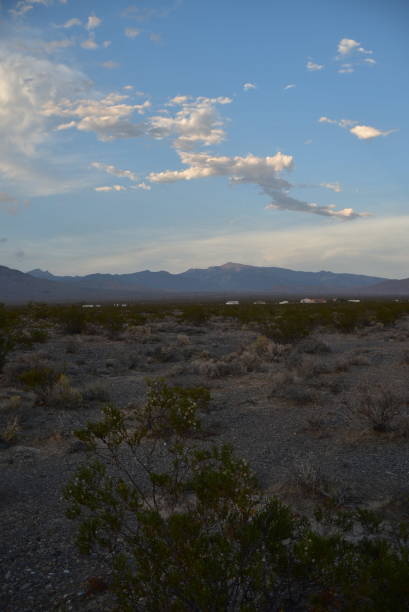 istock blue sky and clouds over the Mojave Desert landscape 1006875376