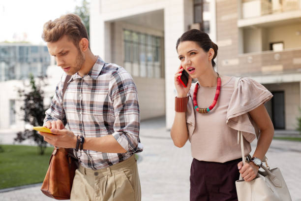 istock Nice pleasant woman answering the call 1006875726