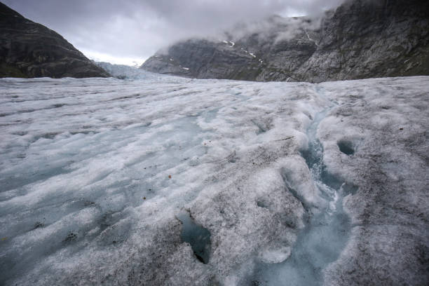 istock Blue ice of Nigardsbreen glacier 1006895626