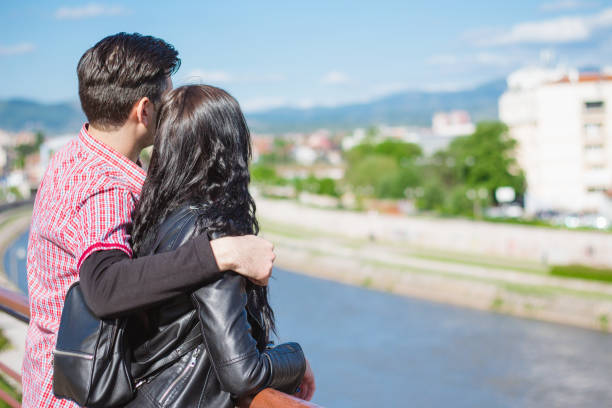 istock Couple enjoying in view on city river. 1006896872