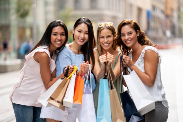 istock Happy multi-ethnic group of women shopping 1006904338