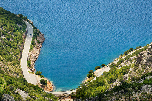 Scenic coastal road under Velebit mountains on Dalmatian coast, Croatia