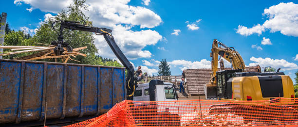 Two Demolition cranes demolishing old row of houses in the Netherlands