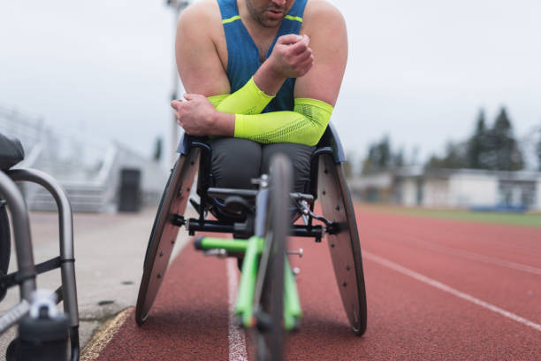 istock Adaptive athlete training on his racing wheelchair 1006925386