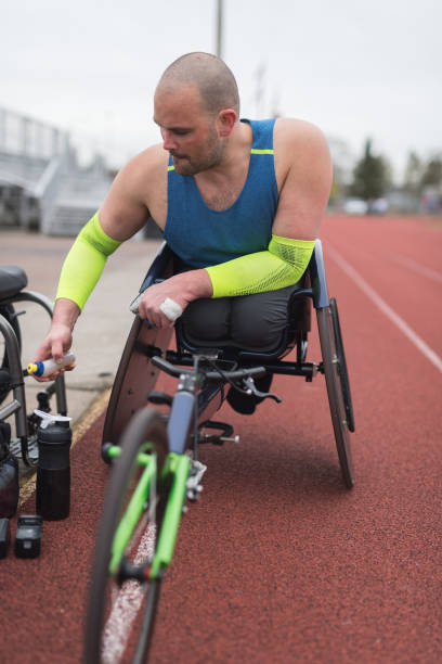 istock Adaptive athlete training on his racing wheelchair 1006925396