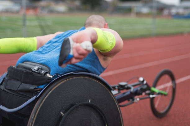 istock Adaptive athlete training on his racing wheelchair 1006925626