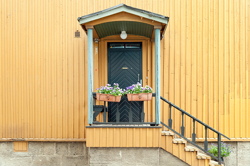 Entrance of traditional wooden house in Helsinki, Finland