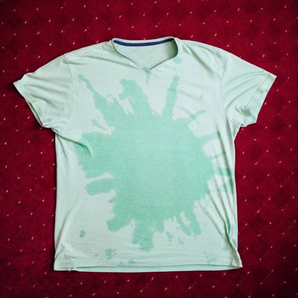 istock wet t-shirt on red background 1006940212