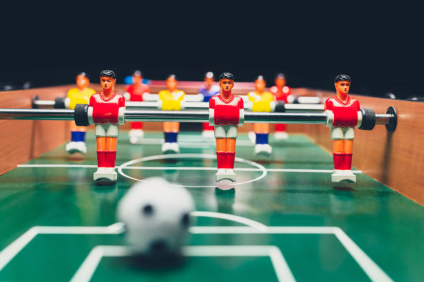 istock table football soccer game players (kicker) 1006940260