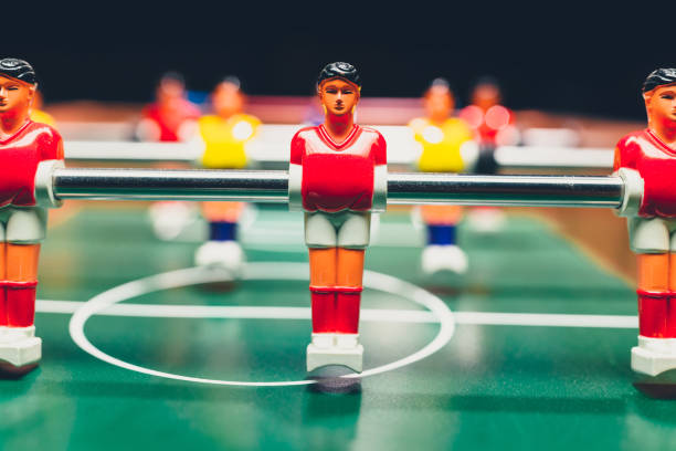 istock table football soccer game players (kicker) 1006940286
