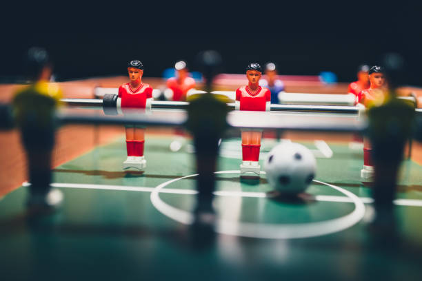 istock table football soccer game players (kicker) 1006940596