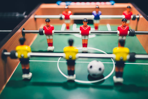istock table football soccer game players (kicker) 1006940696