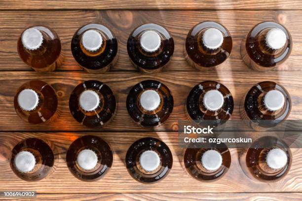 Neatly Aligned Rows Of Bottled Craft Beer Stock Photo - Download Image Now - Bottle, Addiction, Airtight