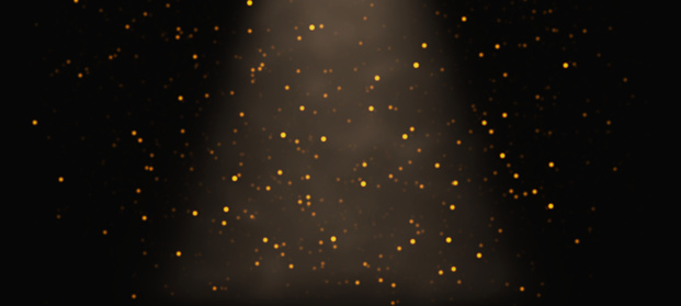 glitter Oro cayendo a través de un cono de luz en frente de un fondo negro - banner photo