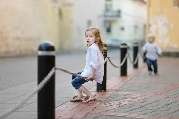 Adorable little girl portrait outdoors at summer