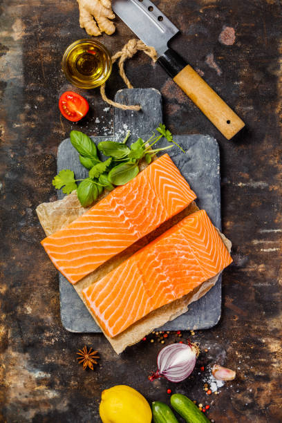 istock Raw salmon fillet and ingredients for cooking 1006968138