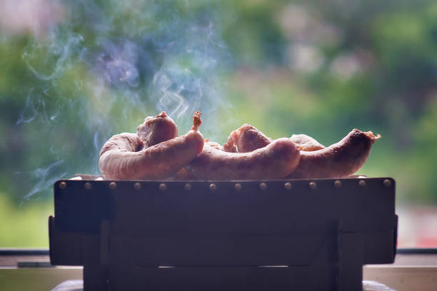 Barbecue in the barbecue at home on the window