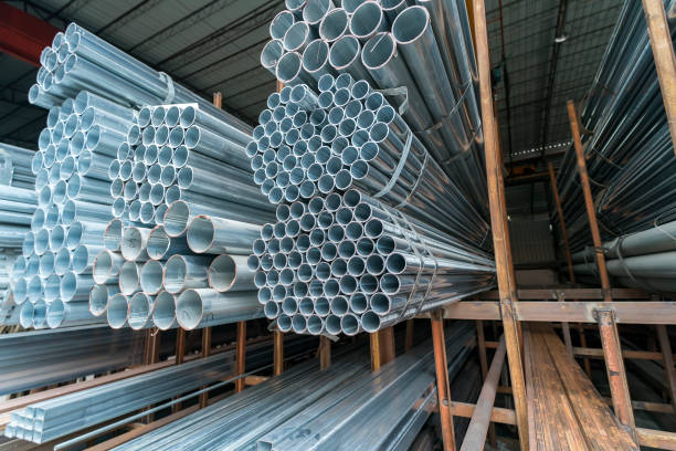 istock Different sizes of metal pipes on shelf 1006984168