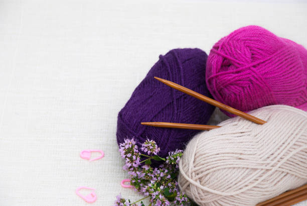 istock Knitting wool yarn and knitting needles 1007001160