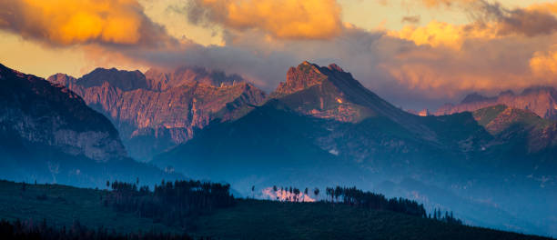 istock Mountain peaks lit by the rising sun. Tatra Mountains , Poland 1007036194