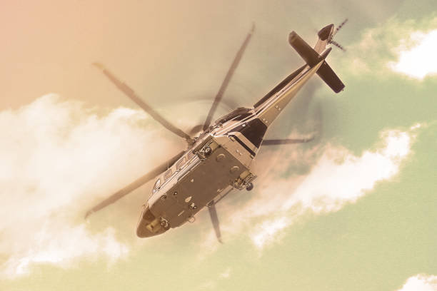 istock helicopter parking landing on offshore platform, Helicopter transfer crews or passenger to work in offshore oil and gas industry, air transportation for support passenger, ground service in airport. 1007036700