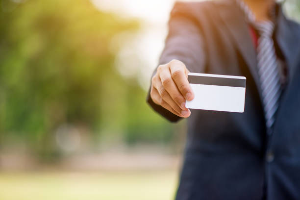 istock Businessman with credit card 1007056262